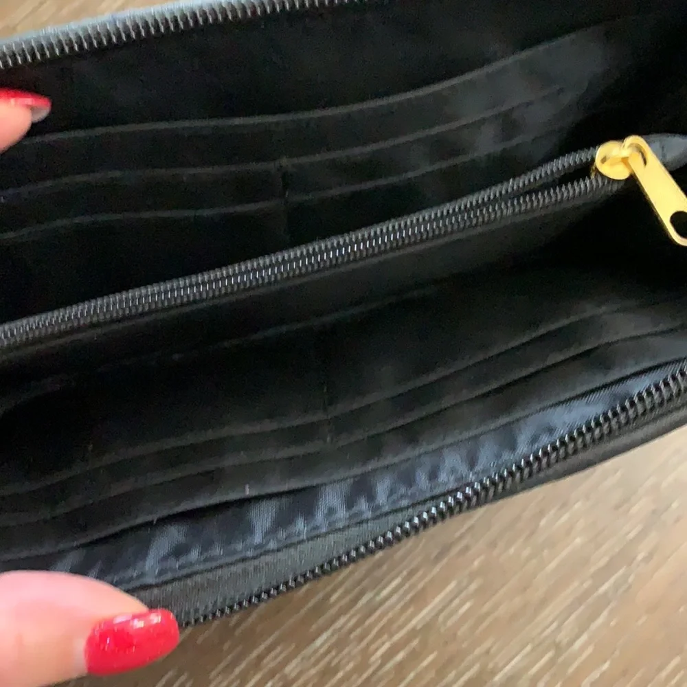 Unbranded black with black brads wristlets